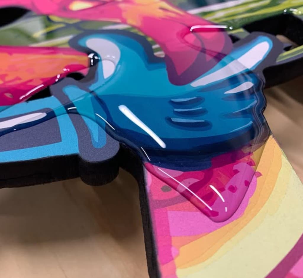 close up of layered graffiti style artwork by Mark Francis Bulk Styles with glossy resin finish