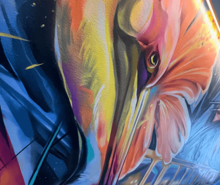 close up of pelican from the Waterfront Stuart mural painted by artist Bulk Styles in Stuart Florida