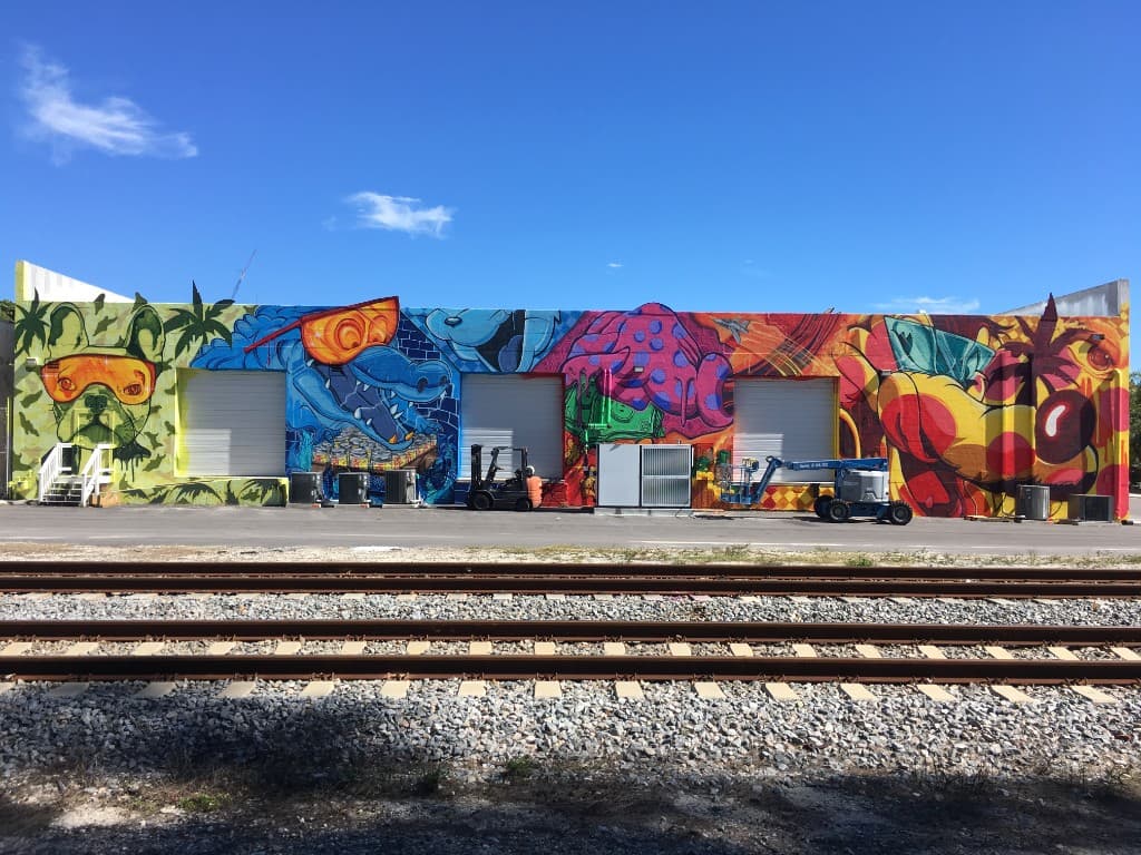 Large exterior mural at Civil Society Brewing Co painted by Mark Francis of Bulk Styles