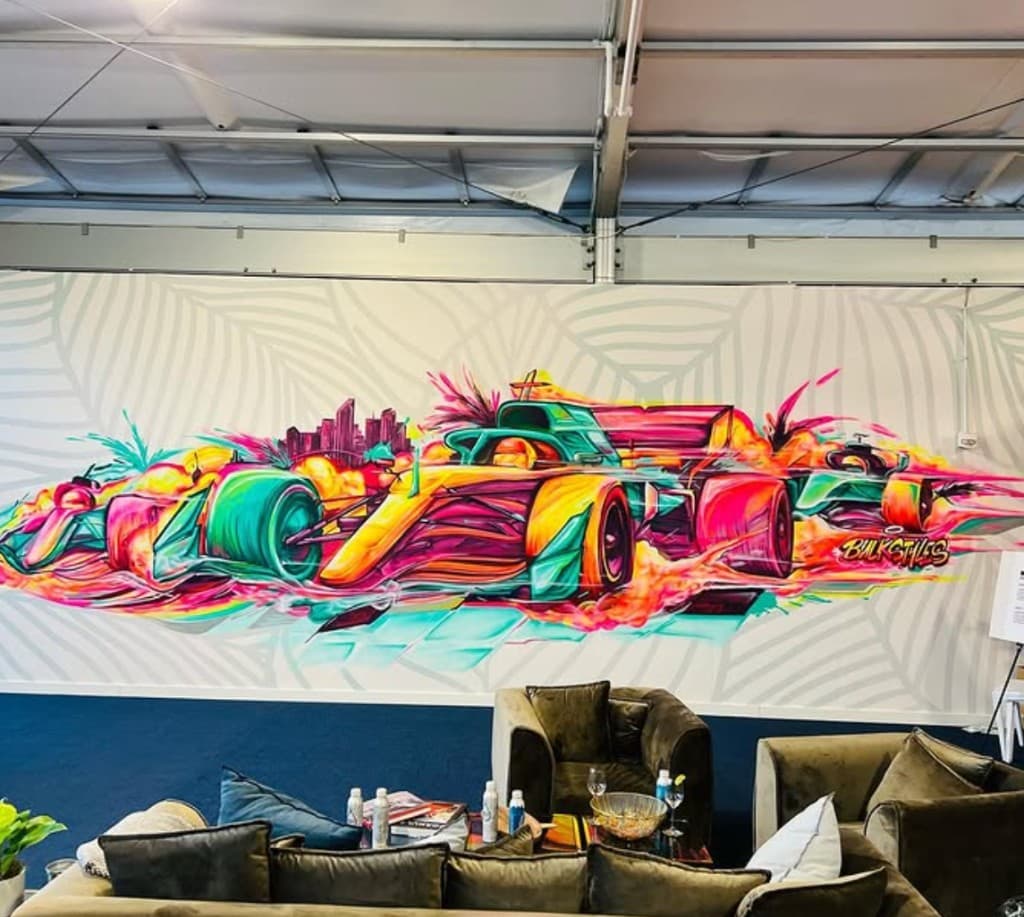 Live mural painting by Bulk Styles at an event or festival