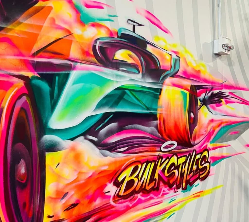 Close up of a colorful Formula 1 race car mural by Bulk Styles at the Miami Grand Prix project