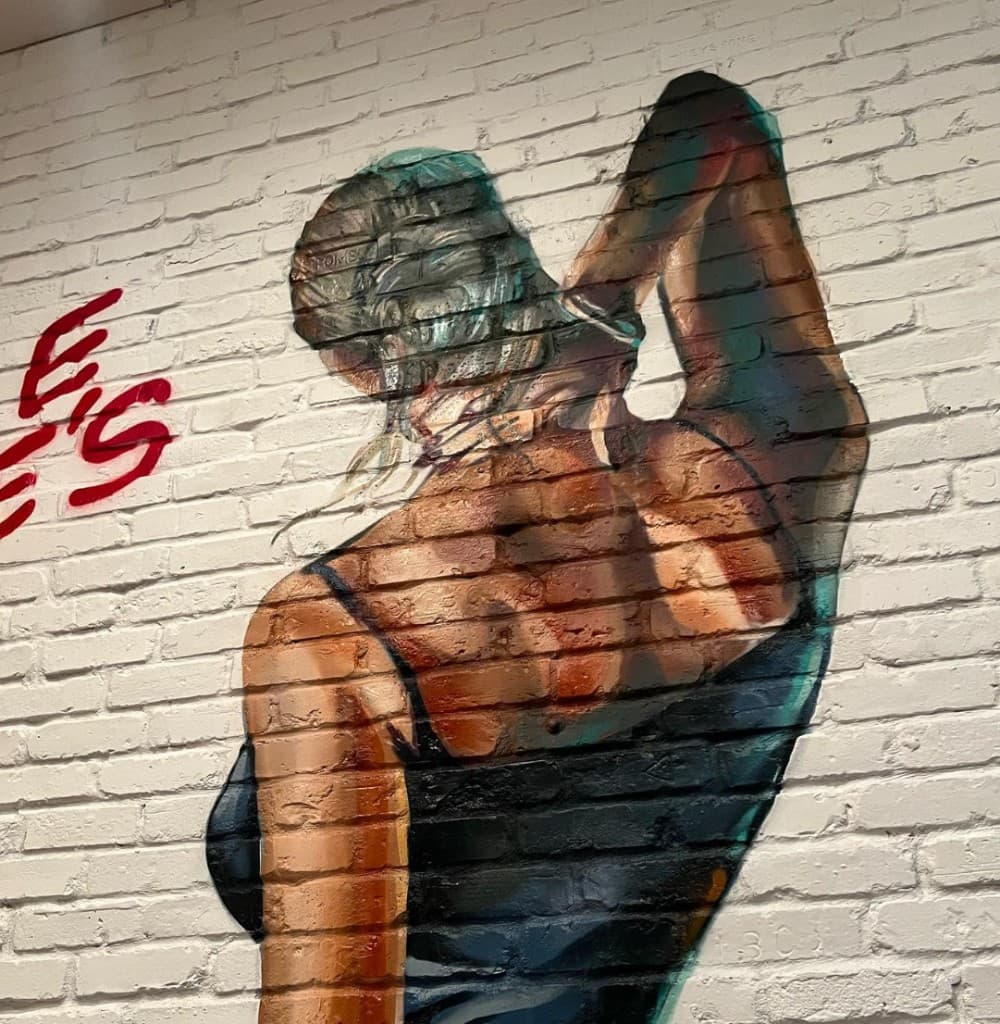 detail of wine themed mural at Lynora's restaurant in West Palm Beach painted by mural artist Mark Francis Bulk Styles