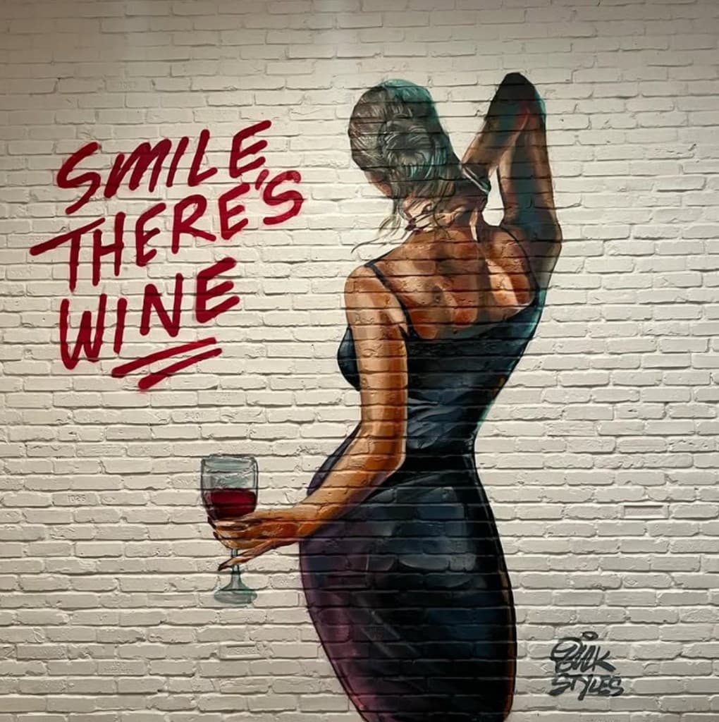 Custom pig mural by Bulk Styles at Lynora's West Palm—hand painted on brick