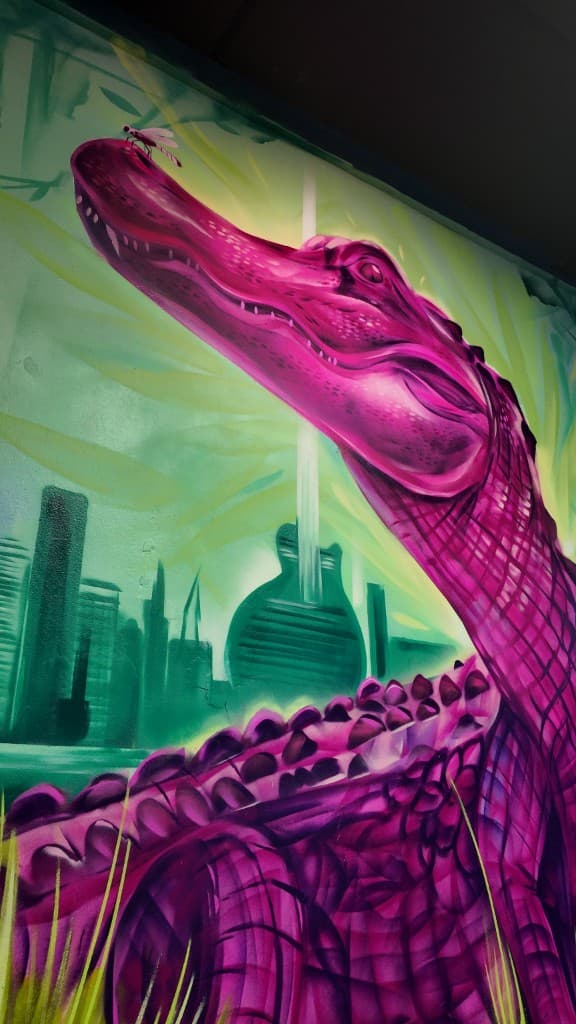 close up of the alligator from the Mack House Brew Pub mural in Fort Lauderdale painted by mural artist Mark Francis Bulk Styles