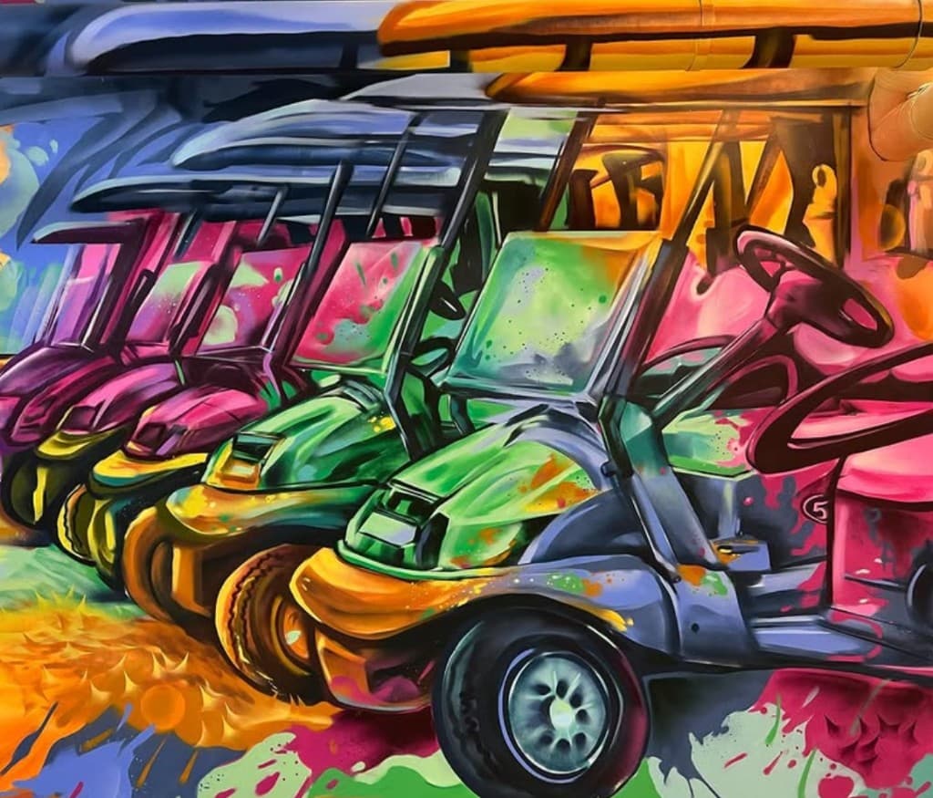 Mural at Admirals Cove - Colorful Golf Carts Lineup
