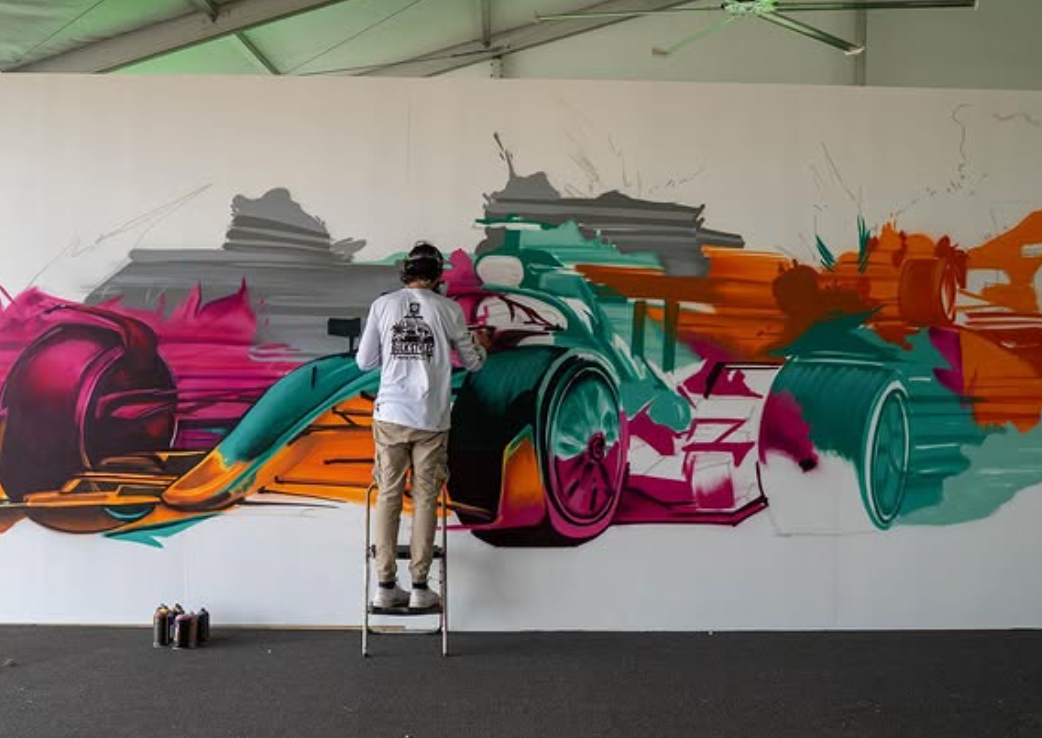 Bulk Styles artist Mark Francis live painting a Formula 1 race car mural at the Miami Grand Prix