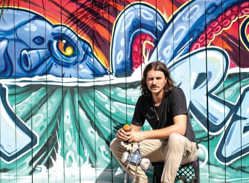 Bulk Styles in front of his mural at Ocean Republic Brewing in Stuart — Stuart Magazine